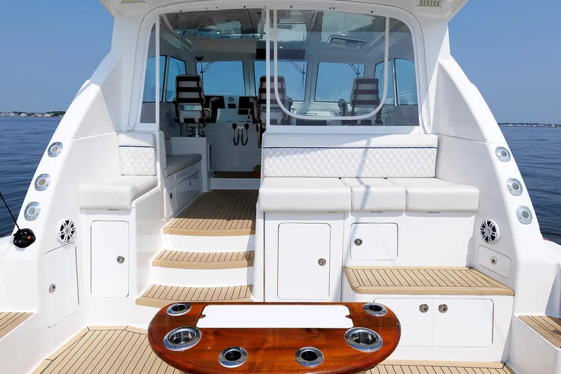 No Whey Yacht Photos Pics 2023 Henriques 42 Express Hardtop boat interior with seating and fishing amenities.