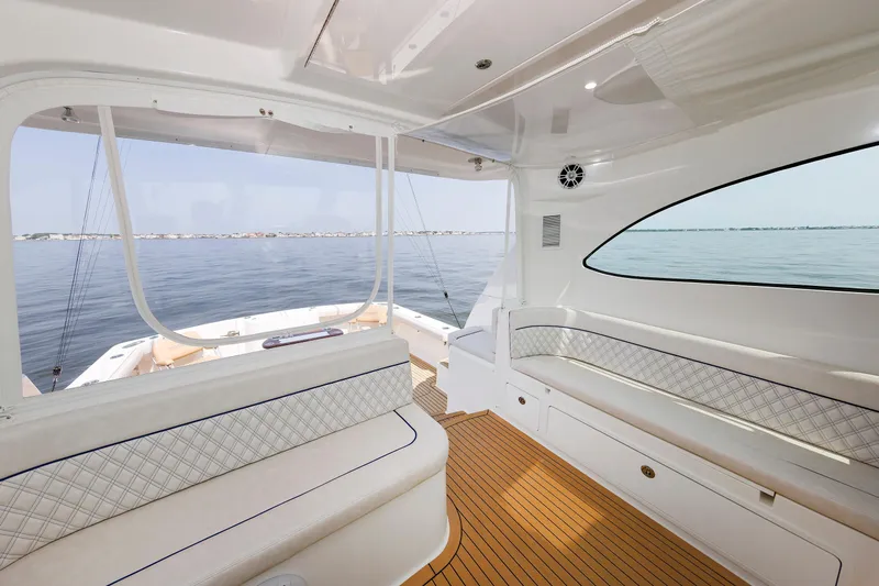 No Whey Yacht Photos Pics Interior view of 2023 Henriques 42 Express Hardtop yacht with ocean backdrop.