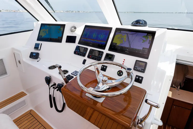 No Whey Yacht Photos Pics 2023 Henriques 42 Express Hardtop helm with advanced navigation displays and controls.