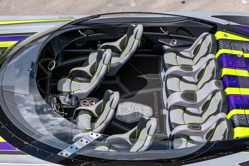  Yacht Photos Pics 2024 MTI 440X boat interior with sleek, modern seating and vibrant accents.