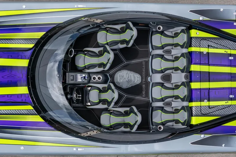  Yacht Photos Pics Top view of 2024 MTI 440X boat interior with vibrant seating and sleek design.