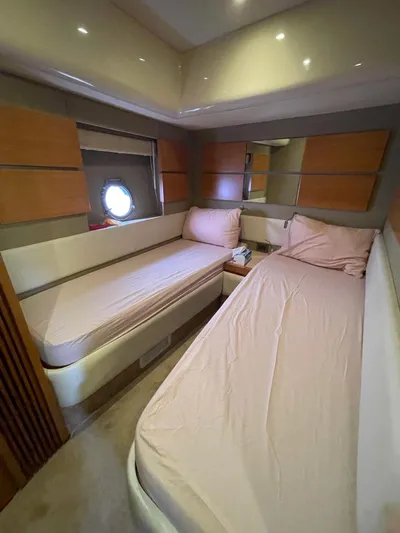 Obsession Yacht Photos Pics Interior of 2012 Azimut 53 yacht with twin beds and modern design.