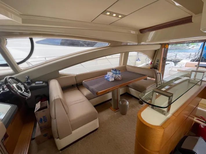 Obsession Yacht Photos Pics Luxurious interior of 2012 Azimut 53 yacht with elegant seating and dining area.
