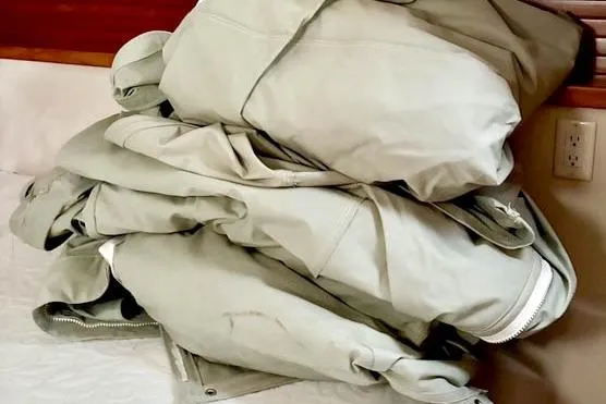 Falken Yacht Photos Pics Pile of beige jackets on a bed, 2017 Catalina model.