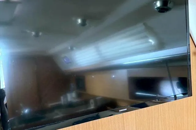 Falken Yacht Photos Pics Reflection on a Samsung TV screen inside a 2017 Catalina boat interior.
