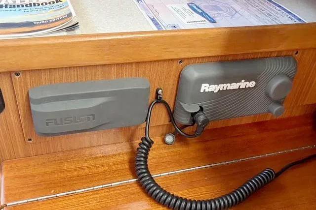 Falken Yacht Photos Pics Control panel of 2017 Catalina boat featuring Raymarine and Fusion equipment.