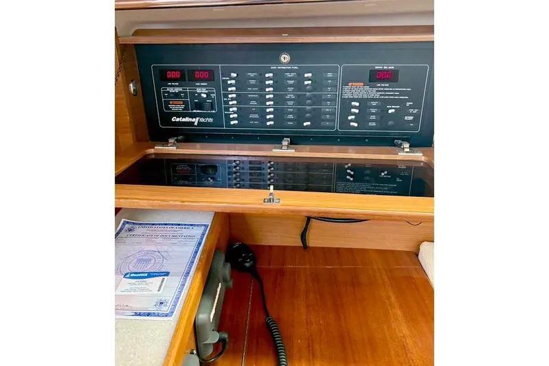 Falken Yacht Photos Pics 2017 Catalina yacht control panel with navigation equipment and documents.