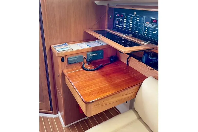 Falken Yacht Photos Pics 2017 Catalina yacht interior with navigation station and control panel.