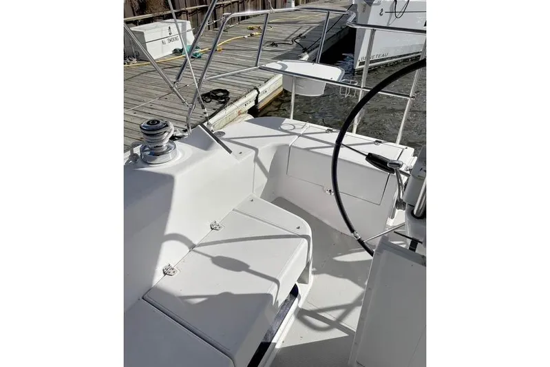 Falken Yacht Photos Pics 2017 Catalina boat cockpit with steering wheel and dock view.
