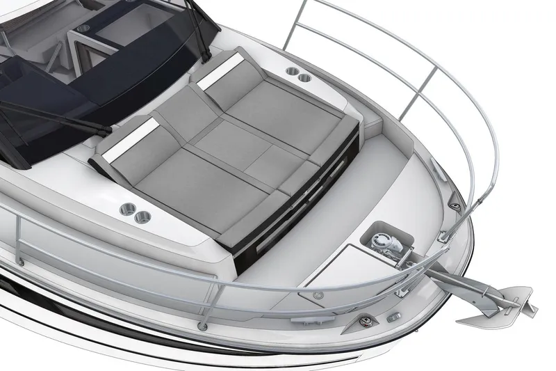  Yacht Photos Pics 2024 Jeanneau Merry Fisher 895 boat with cushioned seating and anchor detail.