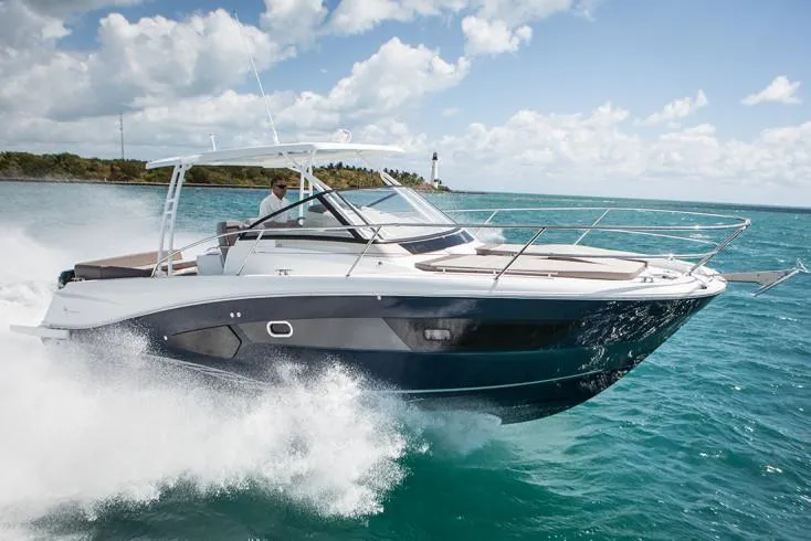 Sabinal Yacht Photos Pics Manufacturer Provided Image: 2019 Jeanneau Leader 10.5 cruising on clear blue water.