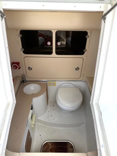Stop Talking Yacht Photos Pics 2014 Chris-Craft Catalina 29 boat bathroom interior with toilet and sink.