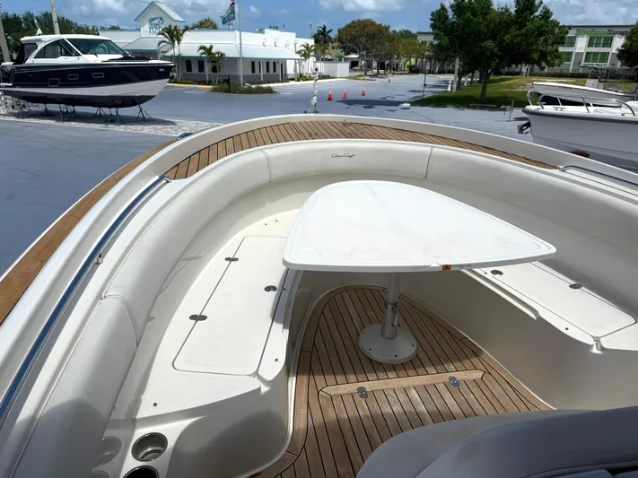 Stop Talking Yacht Photos Pics 2014 Chris-Craft Catalina 29 boat with teak deck and seating area, docked at marina.