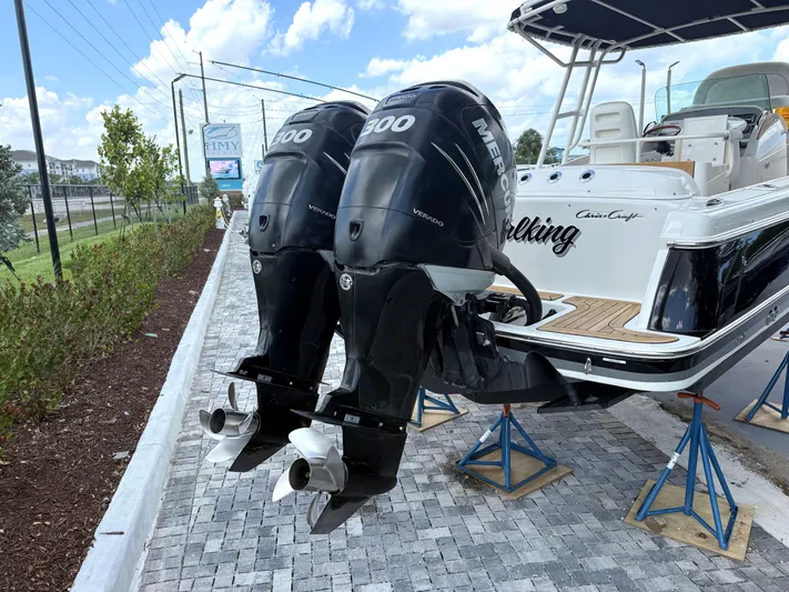 Stop Talking Yacht Photos Pics 2014 Chris-Craft Catalina 29 with twin Mercury outboard engines on display.