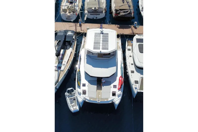  Yacht Photos Pics Aerial view of 2023 Leopard 53 Powercat yacht docked among other boats.