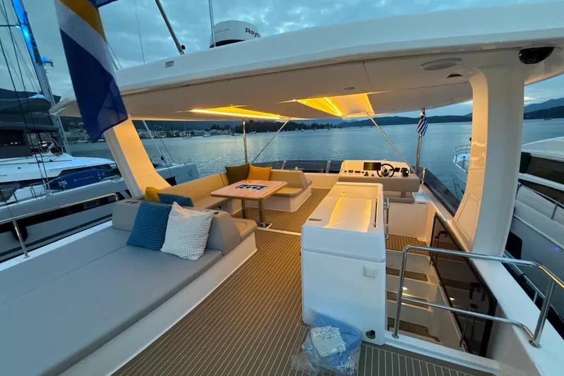  Yacht Photos Pics Luxurious 2023 Leopard 53 Powercat yacht interior with elegant seating and ambient lighting.