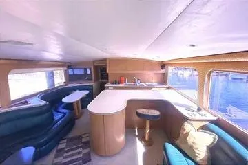 Cyclone Yacht Photos Pics Interior of 1996 Buddy Davis 67 yacht with modern seating and kitchen area.
