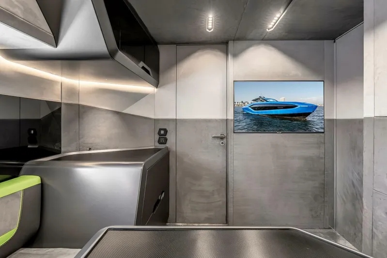 Aspen And Delilah Yacht Photos Pics Modern interior of 2023 Tecnomar 63 Lamborghini yacht with sleek design and luxury features.