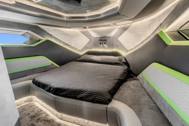 Aspen And Delilah Yacht Photos Pics Luxurious interior of 2023 Tecnomar 63 Lamborghini yacht with modern design and sleek bedding.