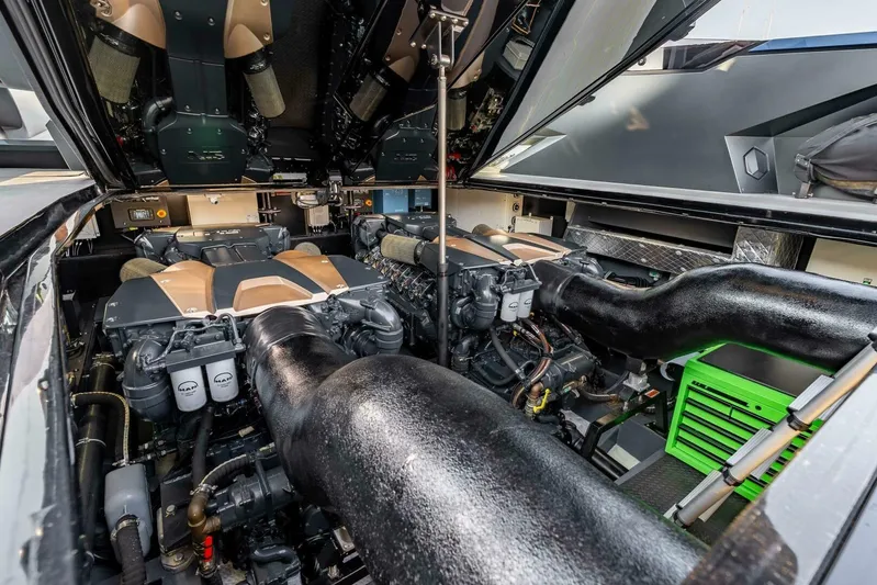 Aspen And Delilah Yacht Photos Pics Engine room of 2023 Tecnomar 63 Lamborghini yacht, showcasing powerful dual engines.