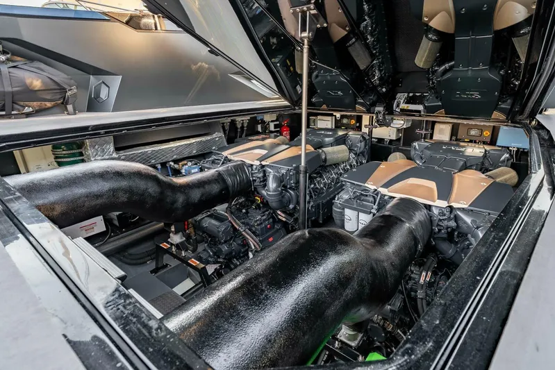 Aspen And Delilah Yacht Photos Pics Engine compartment of 2023 Tecnomar 63 Lamborghini yacht, showcasing powerful dual engines.