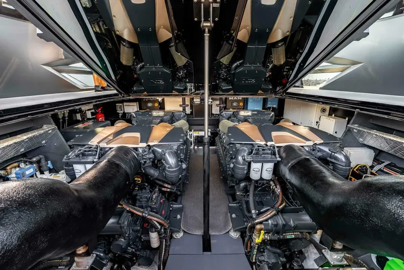 Aspen And Delilah Yacht Photos Pics Engine room of 2023 Tecnomar 63 Lamborghini yacht, showcasing powerful dual engines.