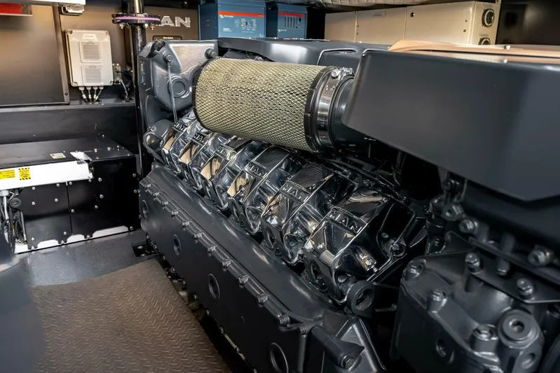 Aspen And Delilah Yacht Photos Pics Engine room of 2023 Tecnomar 63 Lamborghini yacht, featuring a powerful MAN engine.