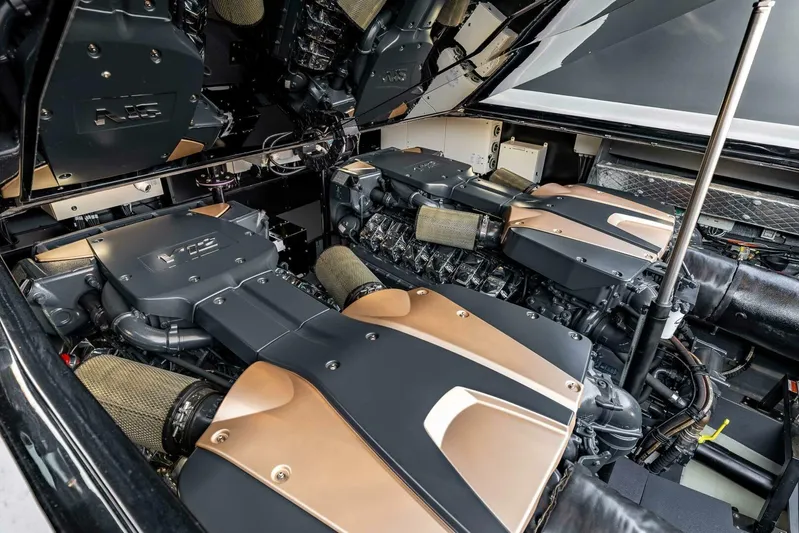 Aspen And Delilah Yacht Photos Pics Engine room of 2023 Tecnomar 63 Lamborghini yacht, showcasing powerful dual engines.