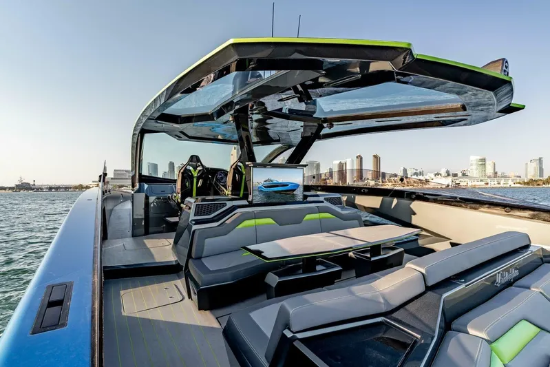 Aspen And Delilah Yacht Photos Pics Luxurious 2023 Tecnomar 63 Lamborghini yacht with sleek design and modern interior.