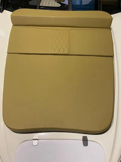  Yacht Photos Pics 2024 Hanover 305 boat seat with beige upholstery and diamond stitching.