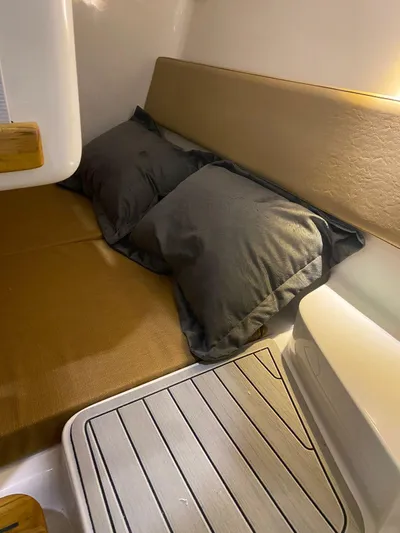  Yacht Photos Pics Cozy cabin interior of 2024 Hanover 305 with comfortable bedding and modern design.