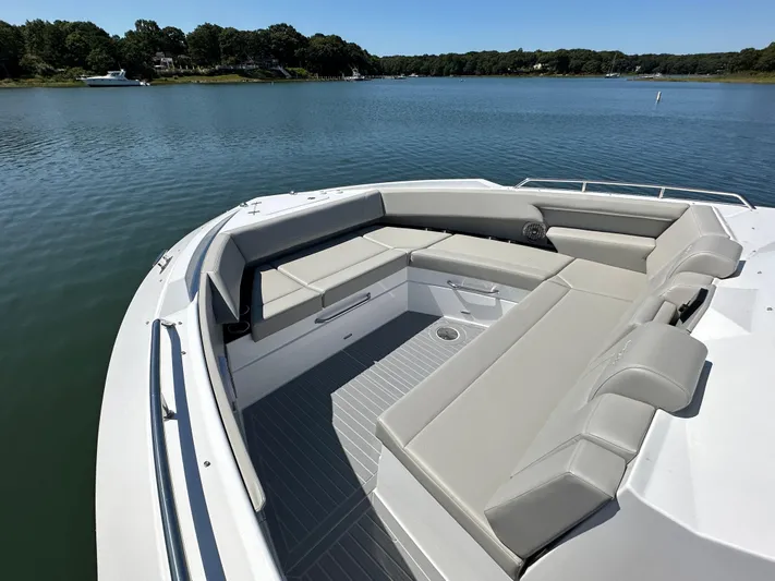  Yacht Photos Pics 2024 Cruisers Yachts 42 GLS Outboard, spacious seating area on calm water.