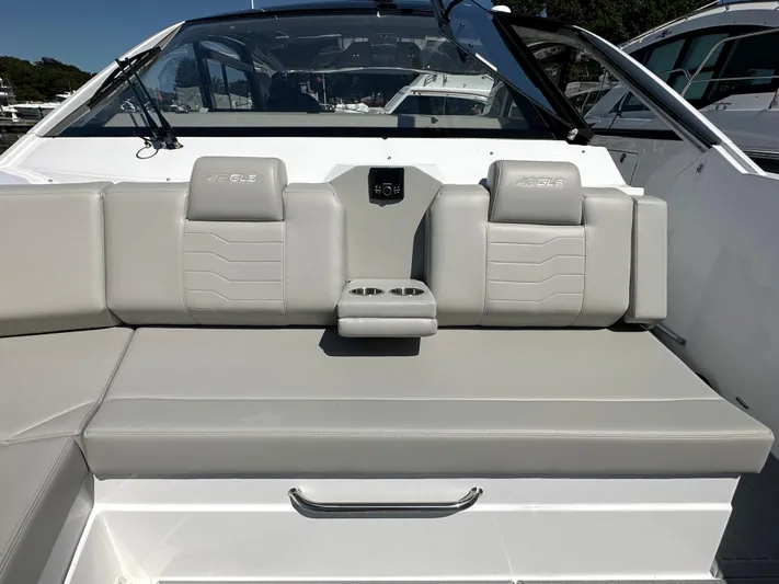  Yacht Photos Pics 2024 Cruisers Yachts 42 GLS Outboard, luxurious seating area with cup holders.