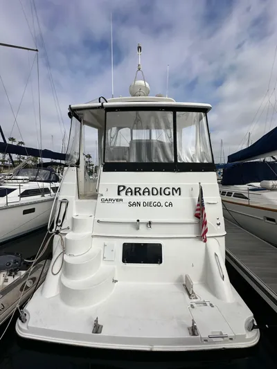Paradigm Yacht Photos Pics 2004 Carver 366 Motor Yacht docked in San Diego, CA, with clear skies above.
