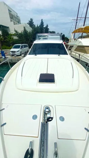  Yacht Photos Pics 2005 Ferretti Yachts 530 docked, showcasing sleek design and spacious deck.