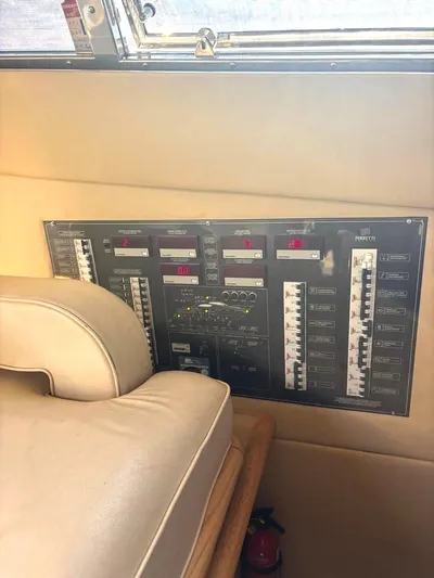  Yacht Photos Pics Control panel inside 2005 Ferretti Yachts 530, featuring various switches and displays.