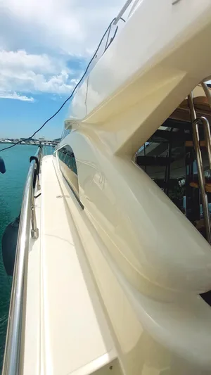  Yacht Photos Pics 2005 Ferretti Yachts 530 side view, showcasing sleek design and luxurious features.