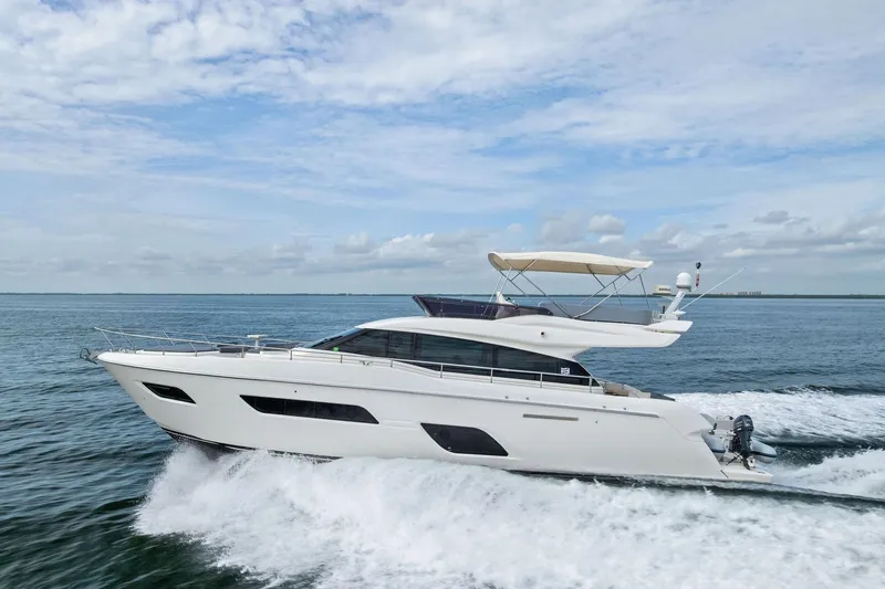 Acqua Yacht Photos Pics 2018 Ferretti Yachts 550 cruising on open water under a clear sky.