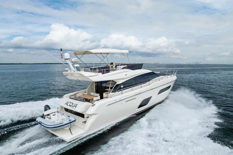 Acqua Yacht Photos Pics 2018 Ferretti Yachts 550 cruising on open water, showcasing sleek design and luxury.