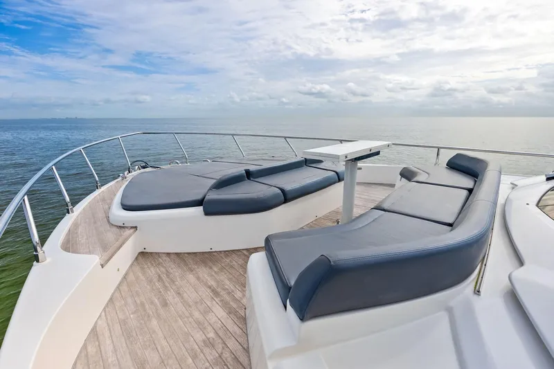 Acqua Yacht Photos Pics Luxurious 2018 Ferretti Yachts 550 deck with elegant seating and ocean view.