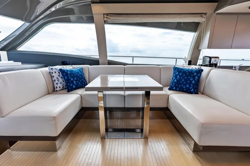 Acqua Yacht Photos Pics Luxurious interior of 2018 Ferretti Yachts 550 with elegant seating and ocean view.