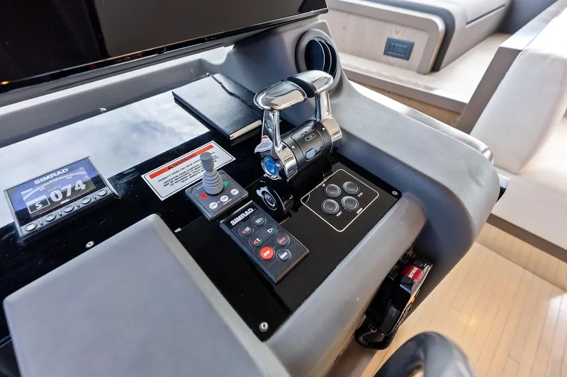 Acqua Yacht Photos Pics Control panel of a 2018 Ferretti Yachts 550, featuring navigation and throttle controls.