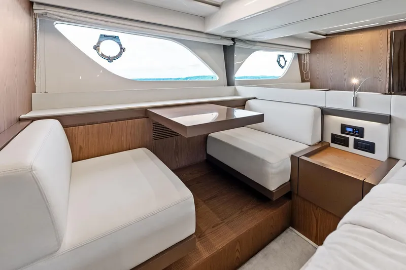Acqua Yacht Photos Pics Luxurious interior of 2018 Ferretti Yachts 550 with elegant seating and modern design.