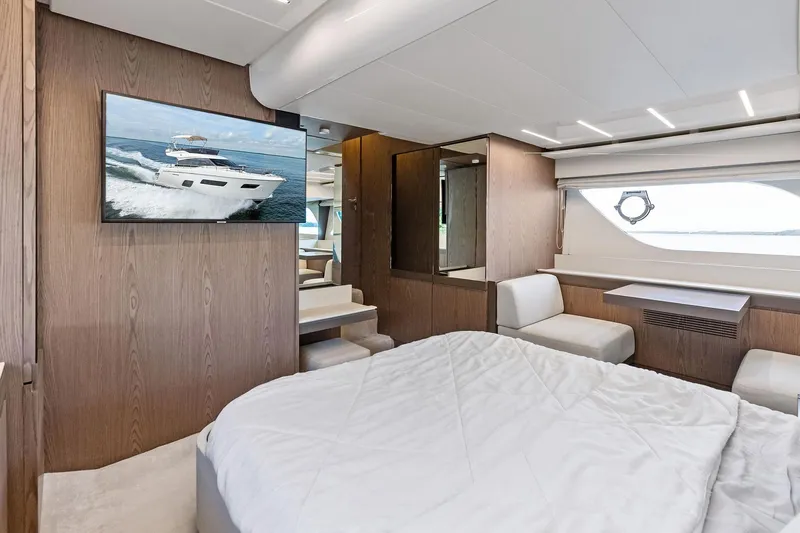 Acqua Yacht Photos Pics Luxurious interior of 2018 Ferretti Yachts 550 with modern furnishings and large window.