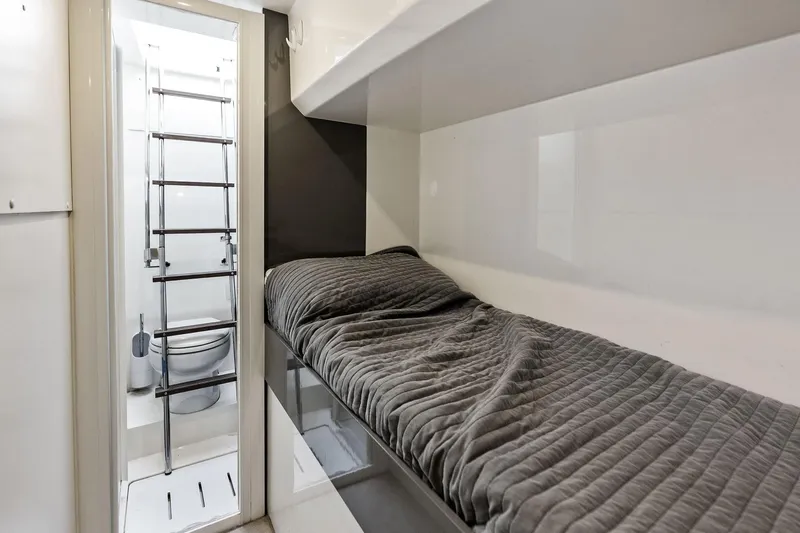 Acqua Yacht Photos Pics 2018 Ferretti Yachts 550 interior cabin with bed and compact bathroom.