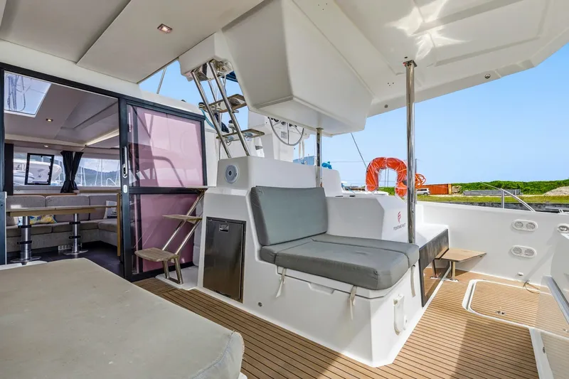 Nauti Mollie Yacht Photos Pics 2020 Fountaine Pajot Astrea 42 Catamaran interior with seating and modern design.