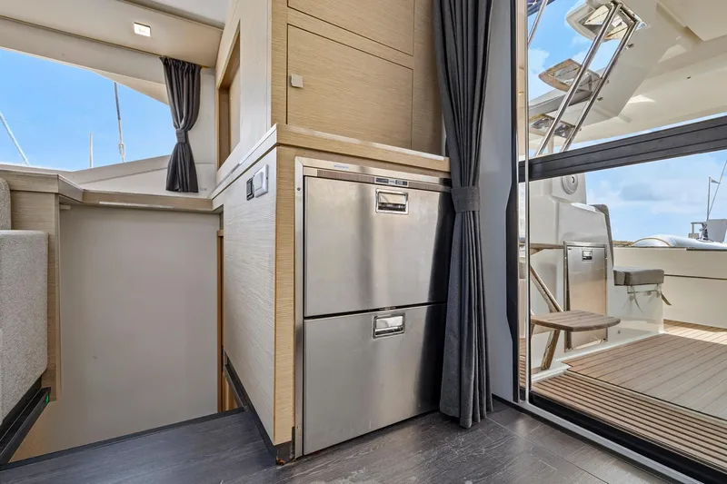Nauti Mollie Yacht Photos Pics Interior of 2020 Fountaine Pajot Astrea 42 Catamaran, featuring modern kitchen appliances and sleek design.