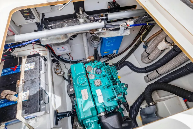 Nauti Mollie Yacht Photos Pics Engine compartment of 2020 Fountaine Pajot Astrea 42 Catamaran, featuring marine engine and batteries.