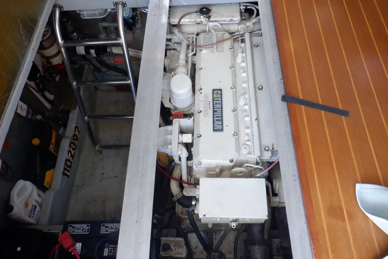 Seaglass Yacht Photos Pics Engine compartment of 1999 Mainship 350 Trawler with Caterpillar engine.