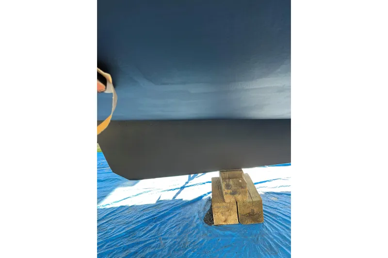 Seaglass Yacht Photos Pics Bottom view of a 1999 Mainship 350 Trawler on wooden blocks.